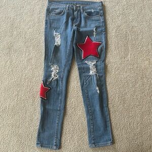 Carmar star jeans with red felt star applique